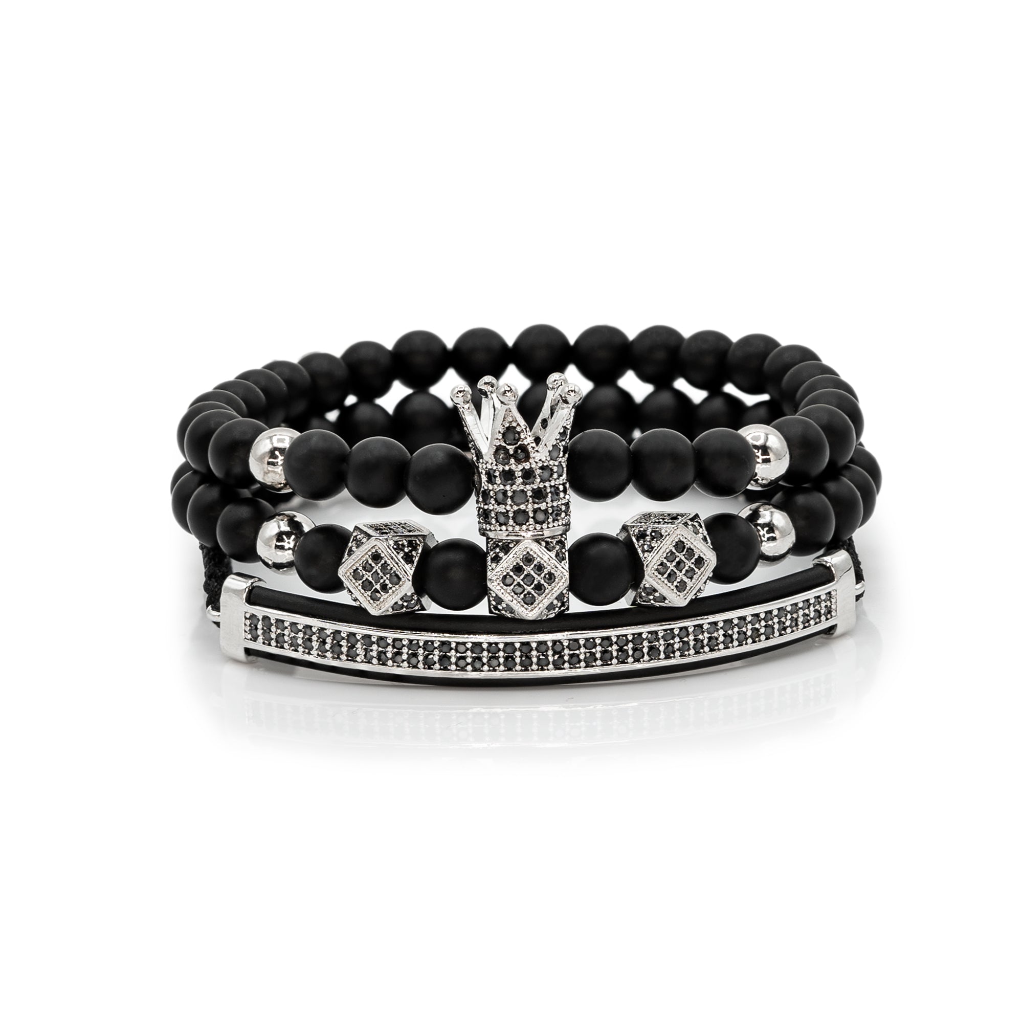 A curated selection of men's accessories including beaded bracelets and pocket squares